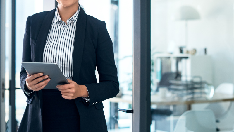 Facility Manager with tablet, managing the office